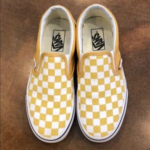 Yellow and white vans